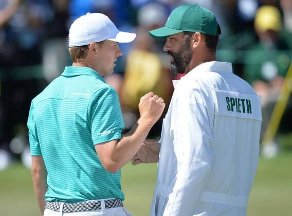 Caddie Michael Greller and Jordan Spieth exchange words on the 18th hole in the first round of the 2016 Masters Tournament at Augusta National in Augusta, Georgia on April 7, 2016.  MAS20160407171 KEVINxDIETSCH