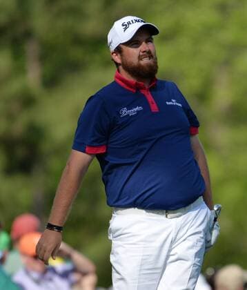 Shane Lowry of Ireland reacts after his tee shot on the 12th hole in the first round of the 2016 Masters Tournament at Augusta National in Augusta, Georgia on April 7, 2016.  MAS20160407183 KEVINxDIETSCH