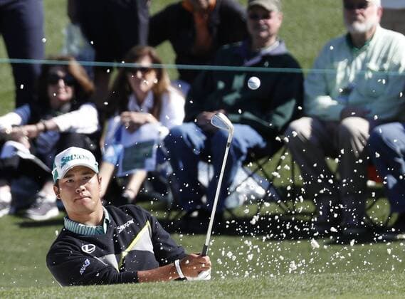 Matsuyama shares 13th place after Masters 1st round Hideki Matsuyama hits a bunker shot on the second hole in the opening round of the Masters Tournament at Augusta National Golf Club in Georgia on April 7, 2016. Matsuyama shot a 1-under 71 to tie for 13th place, five strokes behind first-round leader Jordan Spieth. 