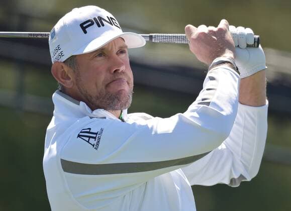 Lee Westwood of England hits his tee shot on the first tee box in the second round of the 2016 Masters Tournament at Augusta National in Augusta, Georgia on April 8, 2016. Tom Watson announced that this 2016 Masters will be his last.  MAS20160408125 KEVINxDIETSCH