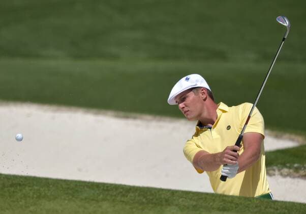 Bryson DeChambeau hits out of a bunker on the 4th hole in the second round of the 2016 Masters Tournament at Augusta National in Augusta, Georgia on April 8, 2016.  MAS20160408157 KEVINxDIETSCH