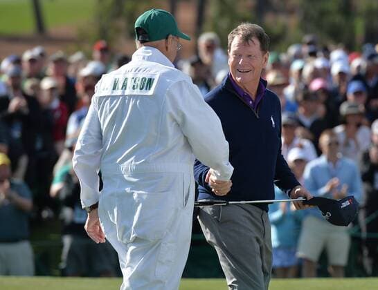 Caddie Neil Oxman shakes hands with Tom Watson on the 18th green in the second round of the 2016 Masters Tournament at Augusta National in Augusta, Georgia on April 8, 2016. Tom Watson missed the cut with a score of 8 over par in his last ever Masters.  MAS20160408171 KEVINxDIETSCH