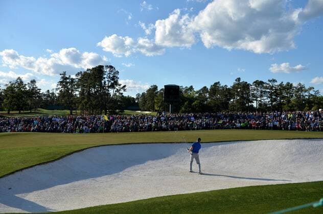Jordan Spieth hits out of a bunker to the 18th green in the second round of the 2016 Masters Tournament at Augusta National in Augusta, Georgia on April 8, 2016.  MAS20160408180 KEVINxDIETSCH