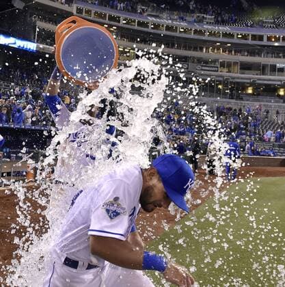 April 8, 2016 - Kansas City, MO, USA - The Kansas City Royals Reymond Fuentes receives a celebratory shower from teammate Salvador Perez after a 4-3 win against the Minnesota Twins on Friday, April 8, 2016, at Kauffman Stadium in Kansas City, Mo. Minnesota at Kansas City - ZUMAm67_