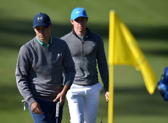Jordan Spieth and Rory McIlroy walk to the 10th green in the third round of the 2016 Masters Tournament at Augusta National in Augusta, Georgia on April 9, 2016.  MAS20160409129 KEVINxDIETSCH