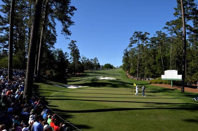 Caddie Michael Greller and Jordan Spieth walk off of the 10th green in the third round of the 2016 Masters Tournament at Augusta National in Augusta, Georgia on April 9, 2016.  MAS20160409132 KEVINxDIETSCH