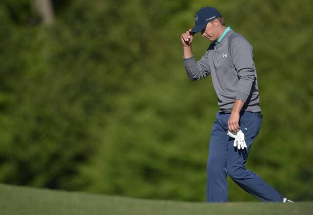 Jordan Spieth tips his hat as he walks to the 12th tee box in the third round of the 2016 Masters Tournament at Augusta National in Augusta, Georgia on April 9, 2016.  MAS20160409135 KEVINxDIETSCH