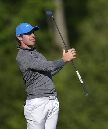 Rory McIlroy of Northern Ireland hits his tee shot on the 12th hole in the third round of the 2016 Masters Tournament at Augusta National in Augusta, Georgia on April 9, 2016.  MAS20160409139 KEVINxDIETSCH