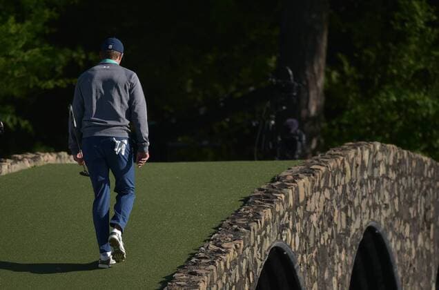 Jordan Spieth walks over the Hogan Bridge to the 12th green in the third round of the 2016 Masters Tournament at Augusta National in Augusta, Georgia on April 9, 2016.  MAS20160409141 KEVINxDIETSCH
