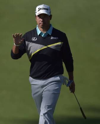 Hideki Matsuyama of Japan reacts to applause on the 10th green in the third round of the 2016 Masters Tournament at Augusta National in Augusta, Georgia on April 9, 2016.  MAS20160409147 KEVINxDIETSCH