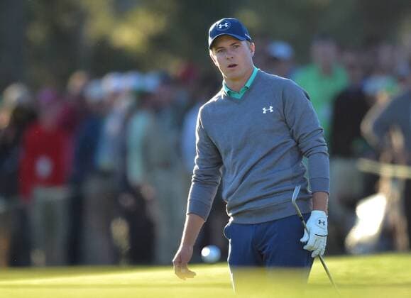 Jordan Spieth reacts after a chip on the 17th hole in the third round of the 2016 Masters Tournament at Augusta National in Augusta, Georgia on April 9, 2016.  MAS20160409168 KEVINxDIETSCH