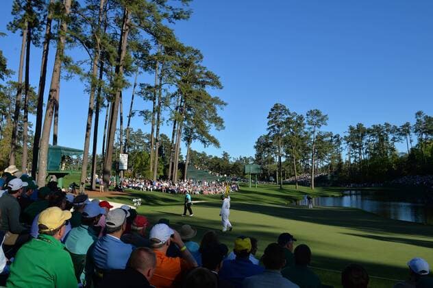 Players walk off of the 16th green in the third round of the 2016 Masters Tournament at Augusta National in Augusta, Georgia on April 9, 2016.  MAS20160409174 KEVINxDIETSCH