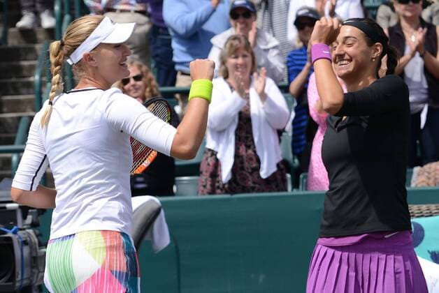 April 10, 2016 - Charleston, South Carolina, United States - CAROLINE GARCIA and KRISTINA MLADENOVIC of France celebrate winning the doubles title at the Volvo Car Open Tennis 2016 - Volvo Car Open - Day 7 - ZUMAl132