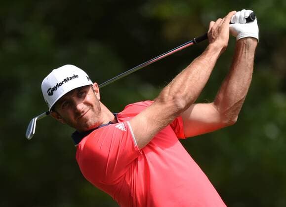Dustin Johnson hits his tee shot on the 4th hole in the final round of the 2016 Masters Tournament at Augusta National in Augusta, Georgia on April 10, 2016.  MAS20160410102 KEVINxDIETSCH