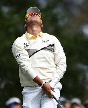Hideki Matsuyama of Japan reacts after he hits his tee shot on the 4th hole in the final round of the 2016 Masters Tournament at Augusta National in Augusta, Georgia on April 10, 2016.  MAS20160410106 KEVINxDIETSCH