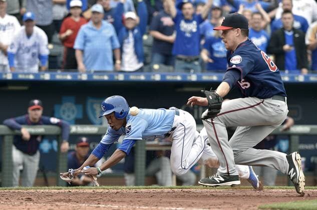 Baseball, MLB, Kansas City Royals - Minnesota Twins April 10, 2016 - Kansas City, MO, USA - Kansas City Royals Terrance Gore scores on a wild pitch from Minnesota Twins relief pitcher Trevor May during the tenth inning on Sunday, April 10, 2016, at Kauffman Stadium in Kansas City, Mo. Minnesota Twins at Kansas City Royals - ZUMAm67_