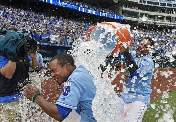 Baseball, MLB, Kansas City Royals - Minnesota Twins April 10, 2016 - Kansas City, MO, USA - Kansas City Royals Terrance Gore is showered with water by Salvador Perez after scoring on a wild pitch from Minnesota Twins relief pitcher Trevor May during the tenth inning on Sunday, April 10, 2016, at Kauffman Stadium in Kansas City, Mo. Minnesota Twins at Kansas City Royals - ZUMAm67_