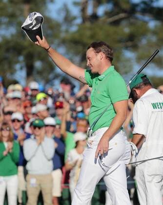 Willett wins Masters after shocking stumble by Spieth Danny Willett of England acknowledges the gallery after coming from behind to win the Masters Tournament by three strokes at Augusta National Golf Club in Georgia on April 10, 2016. Willett shot a 5-under 67 in the final round, while 2015 champion Jordan Spieth of the United States could only manage a 73 to settle for a share of second place. 