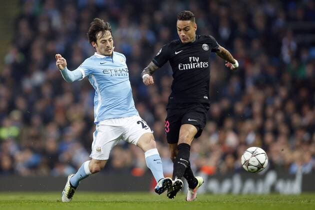 David Silva of Manchester City and Gregory van der Wiel of PSG during the UEFA Champions League Quarter Final match at the Etihad Stadium. Photo credit should read: Philip Oldham Sportimage EDITORIAL USE ONLY. No use with unauthorised audio, video, data, fixture lists, club league logos or live services. Online in-match use limited to 120 images, no video emulation. No use in betting, games or single club league player publications.