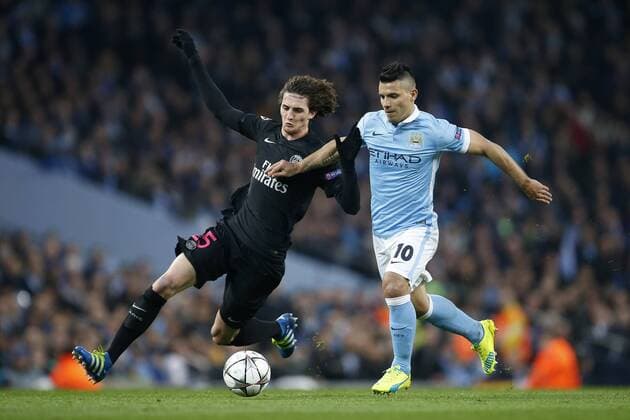 Adrien Rabiot of PSG battles Sergio Aguero of Manchester City during the UEFA Champions League Quarter Final match at the Etihad Stadium. Photo credit should read: Philip Oldham Sportimage EDITORIAL USE ONLY. No use with unauthorised audio, video, data, fixture lists, club league logos or live services. Online in-match use limited to 120 images, no video emulation. No use in betting, games or single club league player publications.