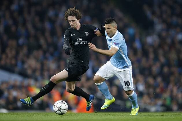 Adrien Rabiot of PSG battles Sergio Aguero of Manchester City during the UEFA Champions League Quarter Final match at the Etihad Stadium. Photo credit should read: Philip Oldham Sportimage EDITORIAL USE ONLY. No use with unauthorised audio, video, data, fixture lists, club league logos or live services. Online in-match use limited to 120 images, no video emulation. No use in betting, games or single club league player publications.