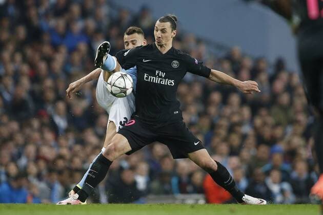Nicolas Otamendi of Manchester City battles Zlatan Ibrahimovic of PSG during the UEFA Champions League Quarter Final match at the Etihad Stadium. Photo credit should read: Philip Oldham Sportimage EDITORIAL USE ONLY. No use with unauthorised audio, video, data, fixture lists, club league logos or live services. Online in-match use limited to 120 images, no video emulation. No use in betting, games or single club league player publications.
