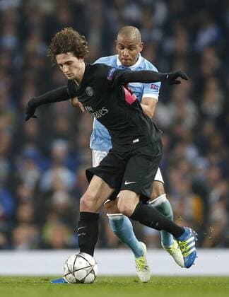 Fernando of Manchester City battles Adrien Rabiot of PSG during the UEFA Champions League Quarter Final match at the Etihad Stadium. Photo credit should read: Philip Oldham Sportimage EDITORIAL USE ONLY. No use with unauthorised audio, video, data, fixture lists, club league logos or live services. Online in-match use limited to 120 images, no video emulation. No use in betting, games or single club league player publications.