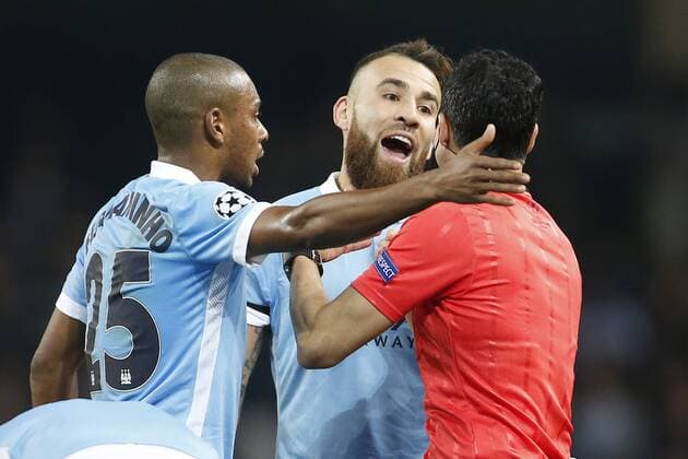 Nicolas Otamendi of Manchester City questions the referees decision to end the first half as his side win a corner kick during the UEFA Champions League Quarter Final match at the Etihad Stadium. Photo credit should read: Philip Oldham Sportimage EDITORIAL USE ONLY. No use with unauthorised audio, video, data, fixture lists, club league logos or live services. Online in-match use limited to 120 images, no video emulation. No use in betting, games or single club league player publications.