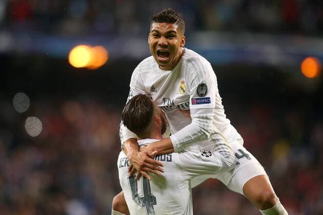 Real Madrid s Sergio Ramos (l) and Carlos Henrique Casemiro celebrate the victory in the Champions League 2015 2016 Quarter-finals 2nd leg match. April 12,2016.  (2016041226)