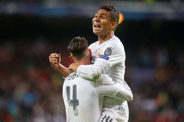 Real Madrid s Sergio Ramos (l) and Carlos Henrique Casemiro celebrate the victory in the Champions League 2015 2016 Quarter-finals 2nd leg match. April 12,2016.  (2016041228)