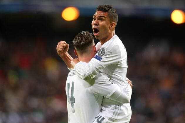 Real Madrid s Sergio Ramos (l) and Carlos Henrique Casemiro celebrate the victory in the Champions League 2015 2016 Quarter-finals 2nd leg match. April 12,2016.  (2016041229)