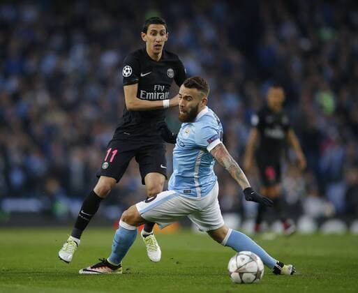 Angel Di Maria of Paris Saint Germain and Nicolas Otamendi of Manchester City during the UEFA Champions League match at The Etihad Stadium. Photo credit should read: Simon Bellis Sportimage EDITORIAL USE ONLY. No use with unauthorised audio, video, data, fixture lists, club league logos or live services. Online in-match use limited to 120 images, no video emulation. No use in betting, games or single club league player publications.