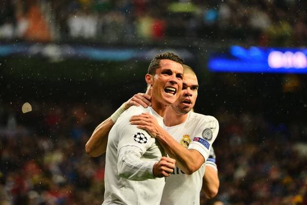 April 12, 2016 - Madrid, Spain - Cristiano Ronaldo of Real Madrid celebrates after scoring his team s second goal during the UEFA Champions League quarter final second leg match between Real Madrid and VfL Wolfsburg at Estadio Santiago Bernabeu on April 12, 2016 in Madrid, Spain. Real Madrid CF v VfL Wolfsburg - UEFA Champions League Quarter Final: Second Leg  - ZUMAn230