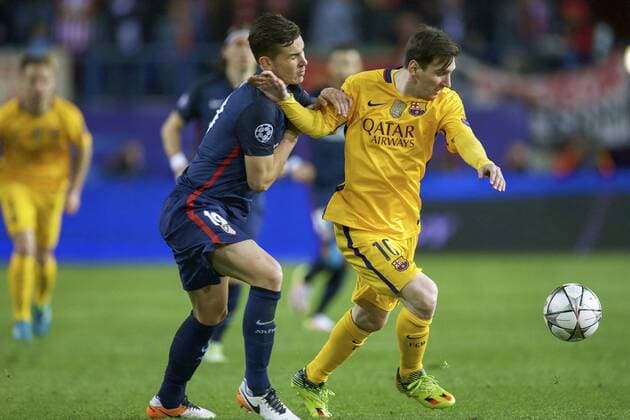 (L-R) Lucas Hernandez of Club Atletico de Madrid, Lionel Messi of FC Barcelona Barca during the UEFA Champions League quarter-final match between Atletico Madrid and FC Barcelona on April 13, 2016 at the Vicente Calderon stadium in Madrid, Spain. Atletico Madrid v FC Barcelona UEFA Champions League 2015 2016 xVIxxIVx 5311498