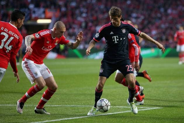 April 13, 2016 - Lisbon, Portugal - Bayern Munich s forward Thomas MÅ¸ller vies with Benfica s defender Victor Lindelof during the UEFA Champions League quarter-final second leg football match between SL Benfica and FC Bayern Munich at the Luz stadium in Lisbon on April 13, 2016...........UEFA Champions League quarter-final second leg football match SL Benfica vs FC Bayern Munich - ZUMAf123