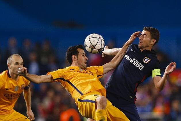 13.04.2016. Madrid, Spain. Sergio Busquets i Burgos (5) FC Barcelona Barca and Grabiel Fenandez Arenas (14) Atletico de Madrid. UCL Champions League between Atletico de Madrid and FC Barcelona at the Vicente Calderon stadium in Madrid, Spain, April 13, 2016 . xEnriquexdexlaxFuentex  ActionPlus11727753