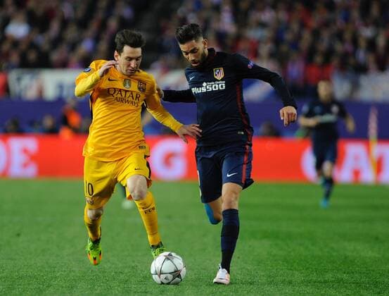 Atletico de Madrid Midfielder, Yannick Ferreira Carrasco - YANNICK CARRASCO, number 21 . FC Barcelona Barca Forward, Lionel Andres Messi - MESSI, number 10. Round Quarter-Finals 2nd leg of the CHAMPIONS league, soccer match between Atletico de Madrid - FC Barcelona at the Vicente Calderon estadium, Madrid - Spain (ESP) by April 13, 2016. PHOTO: Gregorio Lopez.  xGregorioxLopezx x SOCCERxSPAINx