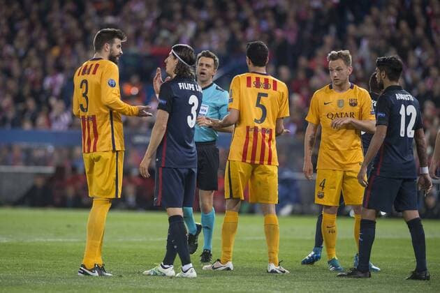 Atletico de Madrid s Filipe Luis and Augusto Fernandez and FC Barcelona Barca Gerard Pique, Sergio Busquets and Ivan Rakitic during Champions League 2015 2016 Quarter-Finals 2nd leg match. April 13, 2016.  (20160413058)