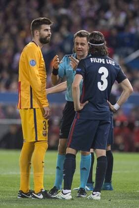Atletico de Madrid s Gerard Pique and FC Barcelona Barca Filipe Luis during Champions League 2015 2016 Quarter-Finals 2nd leg match. April 13, 2016.  (20160413060)