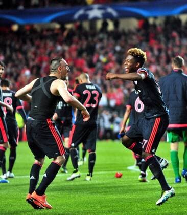 (160414) -- LISBON, April 14, 2016 -- Bayern s Franck Ribery (L) and David Alaba celebrate victory after the second leg of quarterfinals of the Eurpean Champions League soccer match against SL Benfica at the Luz stadium in Lisbon on April 13, 2016. ) (SP)PORTUGAL-LISBON-UEFA CHAMPIONS LEAGUE ZhangxLiyun 