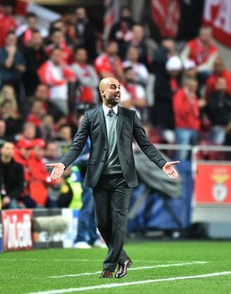 (160414) -- LISBON, April 14, 2016 -- Bayern s coach Josep Guardiola reacts during the second leg of quarterfinals of the Eurpean Champions League soccer match against SL Benfica at the Luz stadium in Lisbon on April 13, 2016. ) (SP)PORTUGAL-LISBON-UEFA CHAMPIONS LEAGUE ZhangxLiyun 