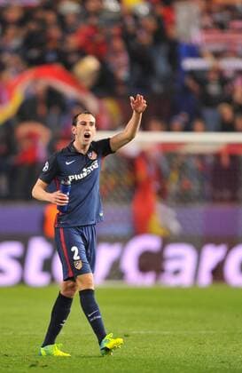 Diego Godin (At. Madrid) celebrates victory over FC Barcelona Barca at the end during the UEFA Champions League 1 4 finals match between Atletico de Madrid and F.C Barcelona played at Estadio Vicente Calderon, Madrid - FOTO : J.M.Colomo  xJ.M.Colomox xx