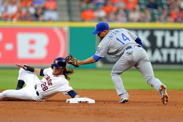APR 14 2016: Kansas City Royals second baseman Omar Infante (14) tags out Houston Astros left fielder Colby Rasmus (28) on a stolen base attempt during the second inning of the MLB Baseball Herren USA baseball game between the Houston Astros and the Kansas City Royals from Minute Maid Park in Houston, TX. Credit image: MLB 2016: Royals vs Astros APR 14 - ZUMAc04_