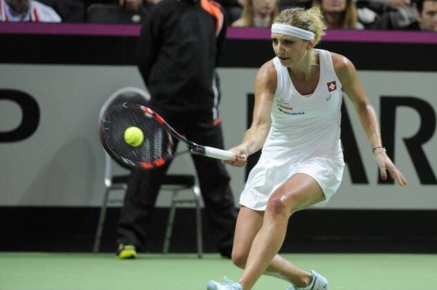 16.04.2016. Messe Luzern, Lucerne, Switzerland. Fed Cup Semi Final. Switzerland Versus Czech Republic. Timea Bacsinszky in action in the match with Barbora Strycova of the Czech Republic xDavidxEmmx  ActionPlus11728476