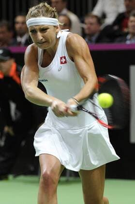 16.04.2016. Messe Luzern, Lucerne, Switzerland. Fed Cup Semi Final. Switzerland Versus Czech Republic. Timea Bacsinszky in action in the match with Barbora Strycova of the Czech Republic xDavidxEmmx  ActionPlus11728478