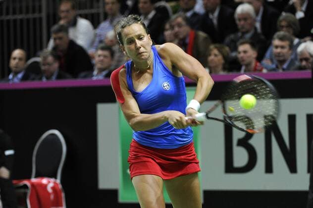 16.04.2016. Messe Luzern, Lucerne, Switzerland. Fed Cup Semi Final. Switzerland Versus Czech Republic. Barbora Strycova in action in the match with Timea Bacsinszky of Switzerland xDavidxEmmx  ActionPlus11728481