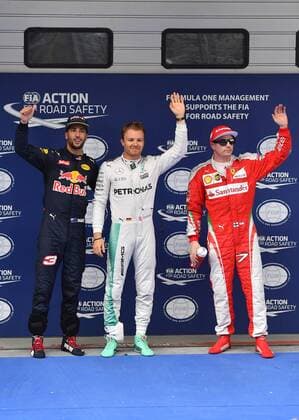 Mercedes driver Nico Rosberg of Germany, center, Red Bull driver Daniel Ricciardo of Australia, left, and Ferrari driver Kimi Raikkonen of Finland wave after winning the first three positions in the qualifying session during the 2016 Formula 1 Chinese Grand Prix in Shanghai, China, 16 April 2016. Nico Rosberg wins pole position for Formula 1 Chinese Grand Prix  20160416_09238