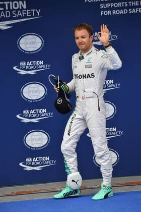 Mercedes driver Nico Rosberg of Germany waves after winning the pole position in the qualifying session during the 2016 Formula 1 Chinese Grand Prix in Shanghai, China, 16 April 2016. Nico Rosberg wins pole position for Formula 1 Chinese Grand Prix  20160416_31825