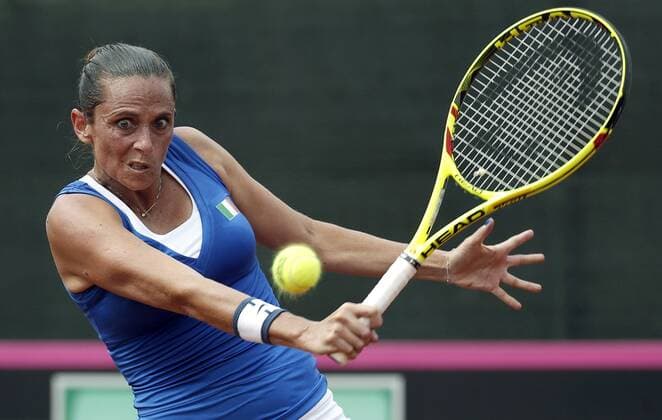Italian Roberta Vinci returns the ball to Spanish Carla Suarez during their game as part of Federation Cup s World Group play-off at Lleida tennis club, northeastern Spain, 16 April 2016. Carla won 6-1 and 6-1. Spain vs. Italy !ACHTUNG: NUR REDAKTIONELLE NUTZUNG!  20160416-635964276481673766