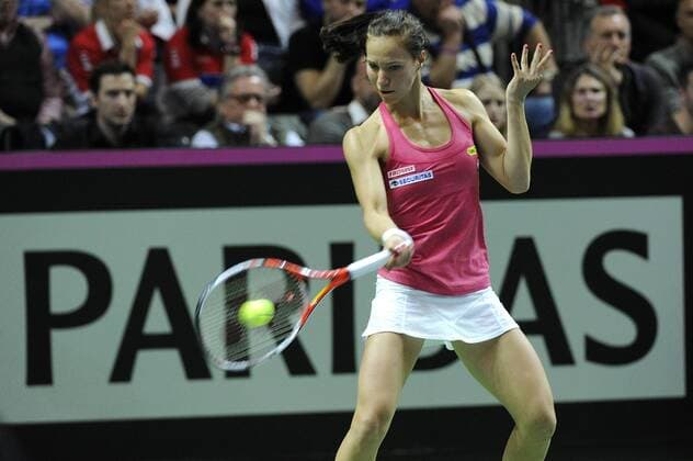 16.04.2016. Messe Luzern, Lucerne, Switzerland. Fed Cup Semi Final. Switzerland Versus Czech Republic. Viktorija Golubic in action in the match between Viktorija Golubic of Switzerland and Karolina Pliskova of the Czech Republic xDavidxEmmx  ActionPlus11728679